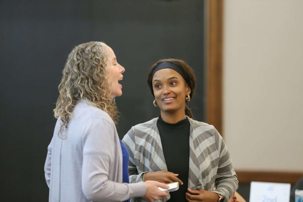 Lastinger Center Senior Coaching Coordinator Maggie Gardener speaks with an educator during a New Worlds Reading Teacher Professional Learning Session.